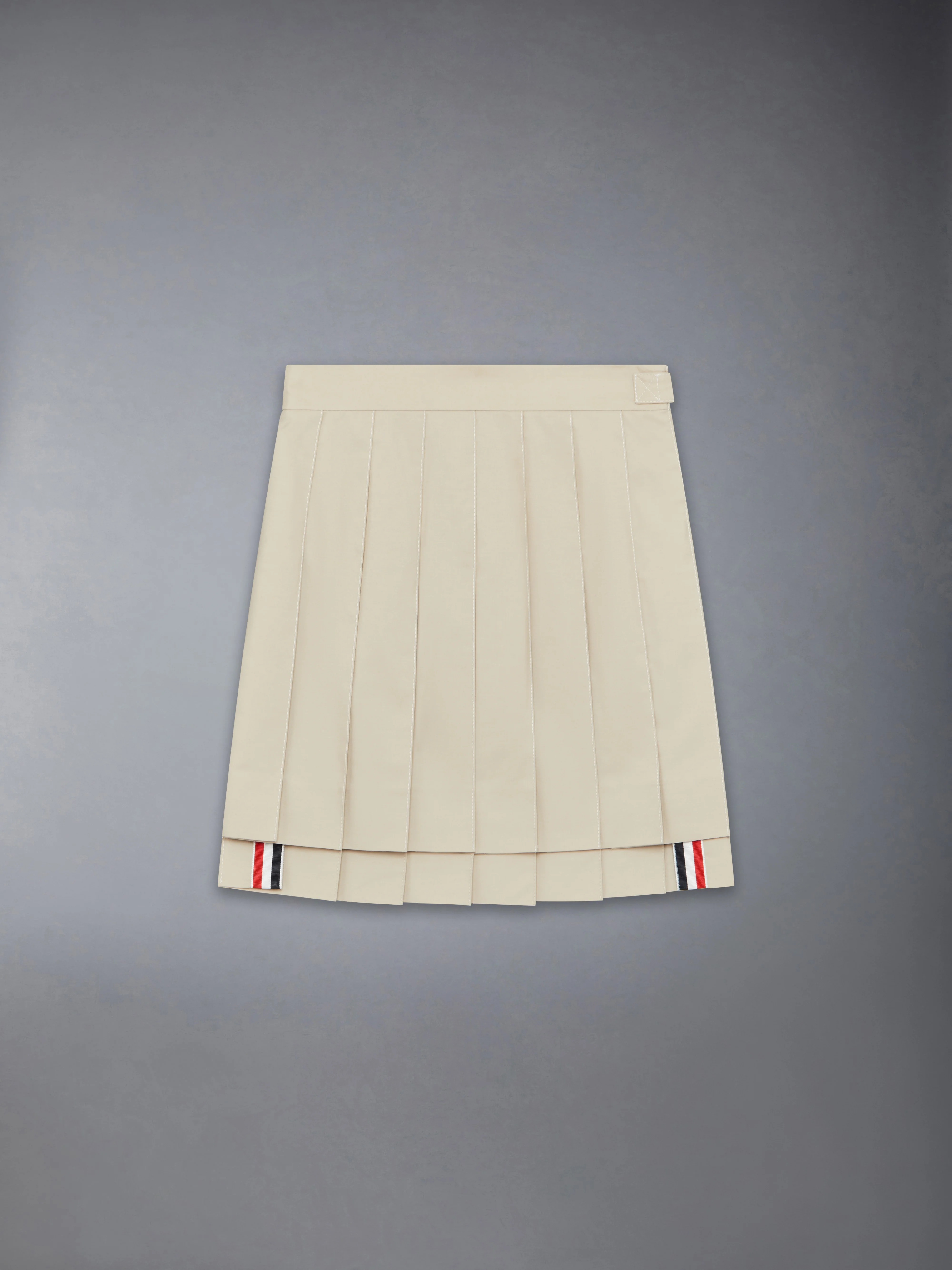 CHILDREN'S TYPEWRITER PLEATED MINI SKIRT