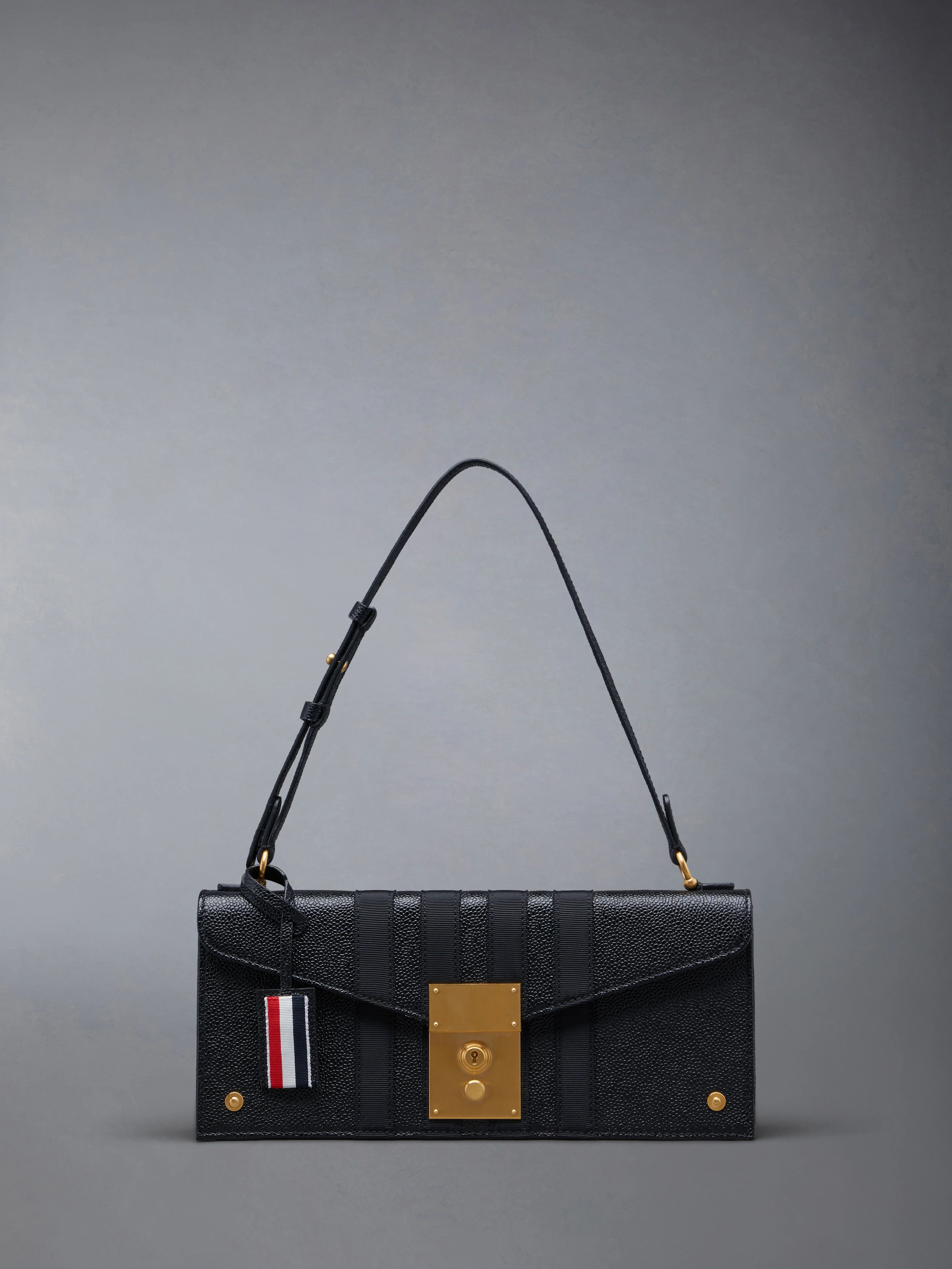 MRS. THOM 4-BAR CLUTCH IN PEBBLE GRAIN LEATHER