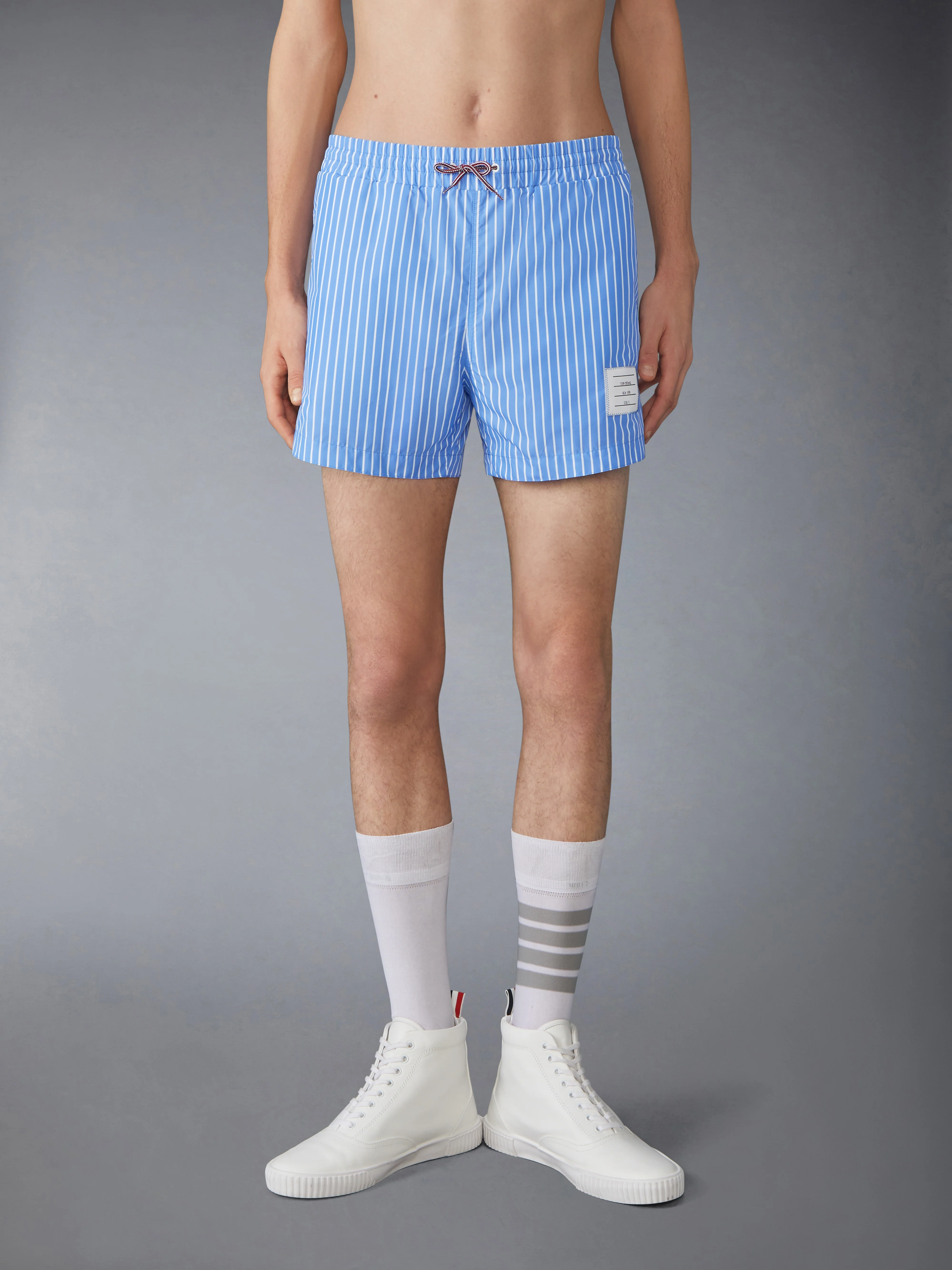 PINSTRIPE PRINTED TECH SWIM SHORTS