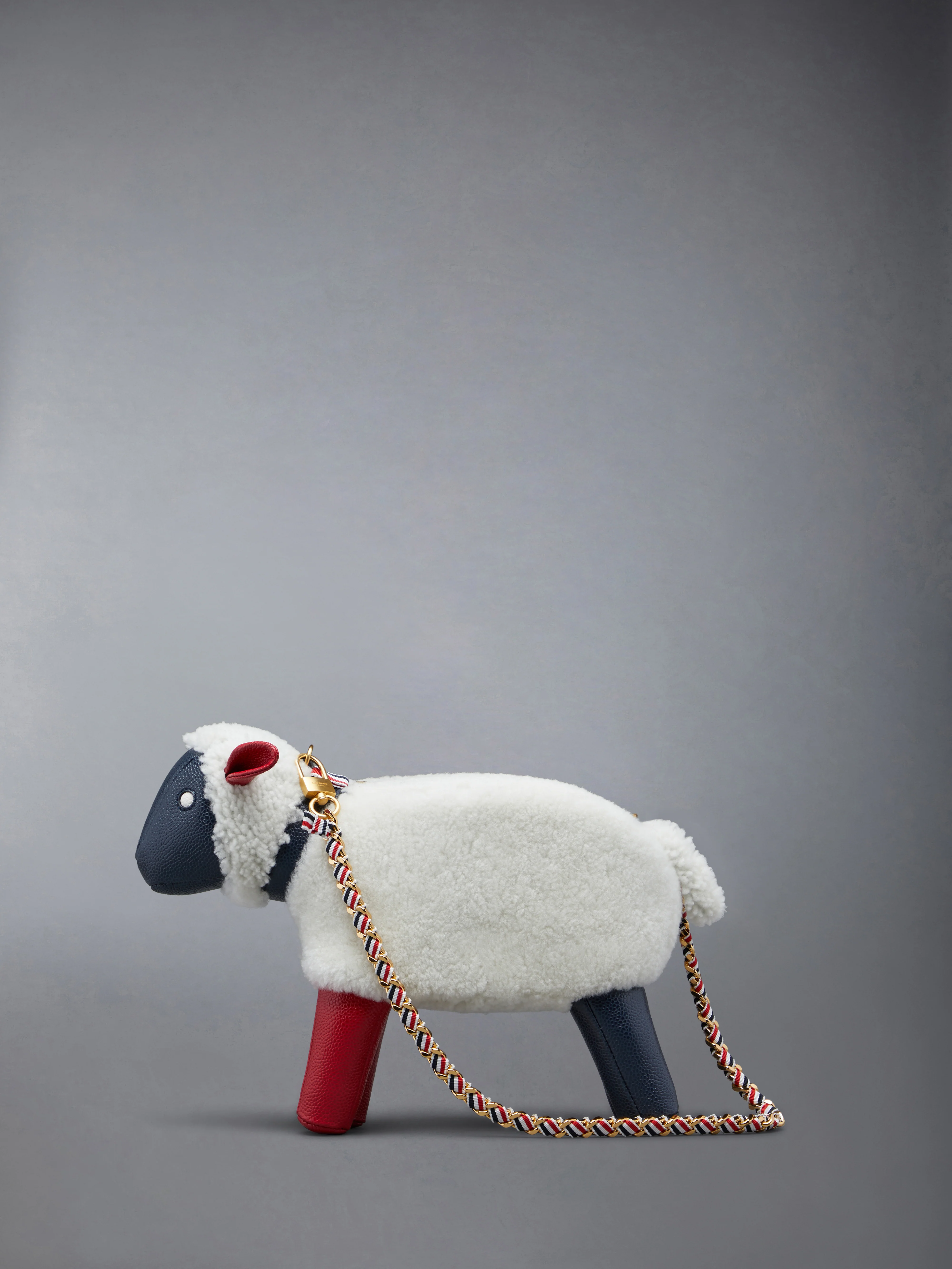 SMALL SHEEP CHAIN BAG IN SHEARLING & PEBBLE GRAIN LEATHER