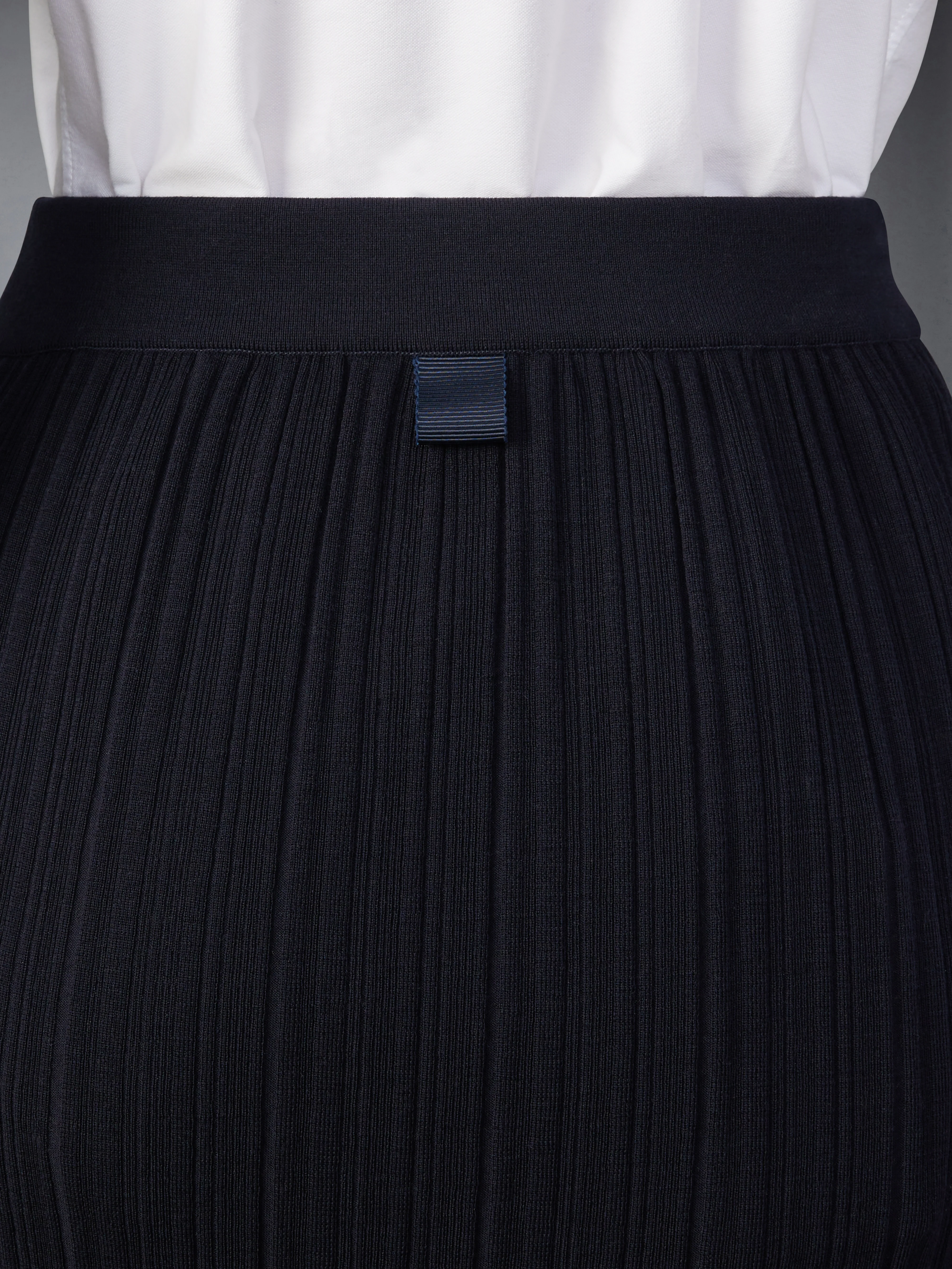 WOOL CREPE RIB STITCH MIDI PLISSE SKIRT - Image 6